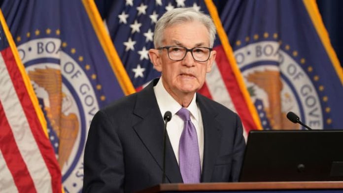 107347300-17024961022023-12-13t193330z_208568318_rc2jw4a2vvjb_rtrmadp_0_usa-economy-fed